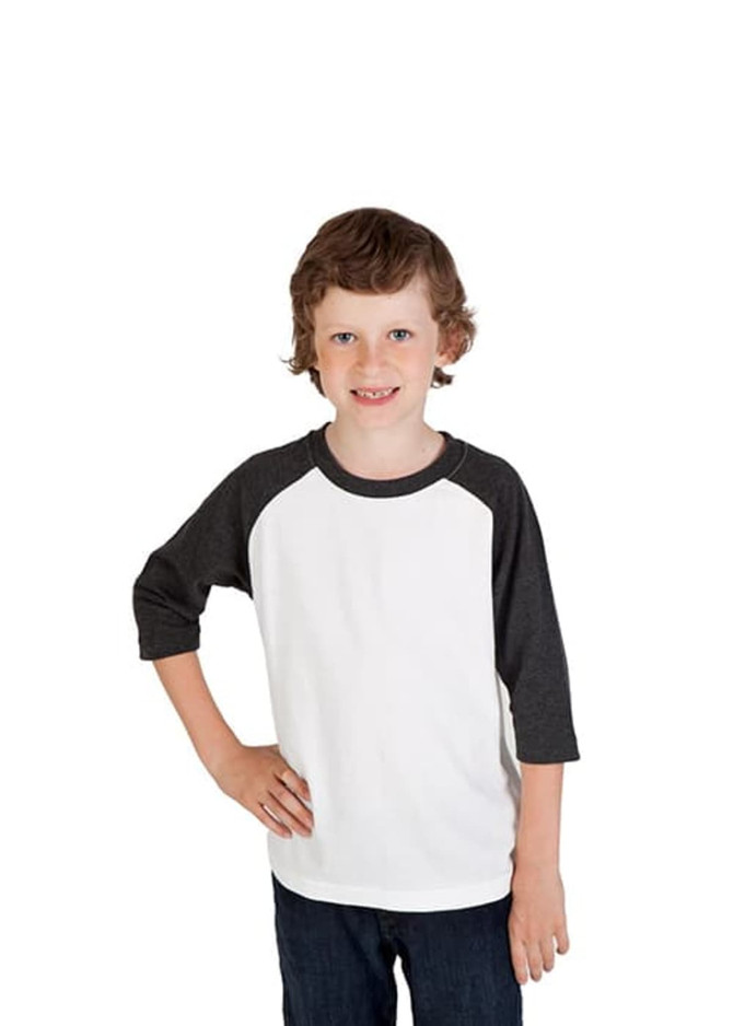 A 3/4 raglan sleeve T-shirt in white with dark grey sleeves, worn by a smiling child. The shirt features a logo.