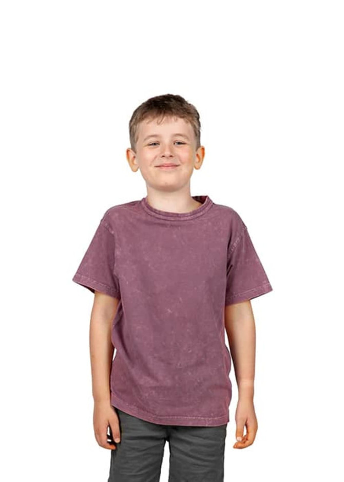 A stone wash T-shirt in a muted purple shade, worn by a smiling boy, with a simple logo on the shirt.
