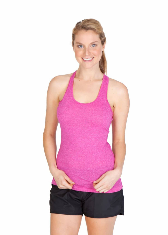 A woman poses wearing a bright pink athletic T-back singlet and black shorts, with a logo on the garment.