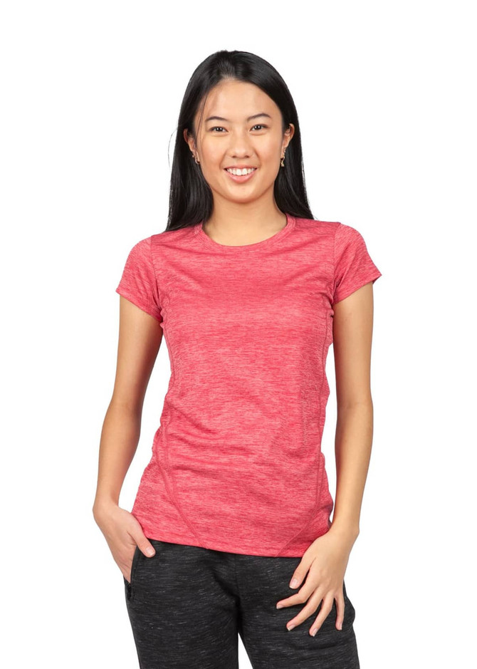 A woman models a red 100% polyester women's T-shirt featuring a logo on the chest.