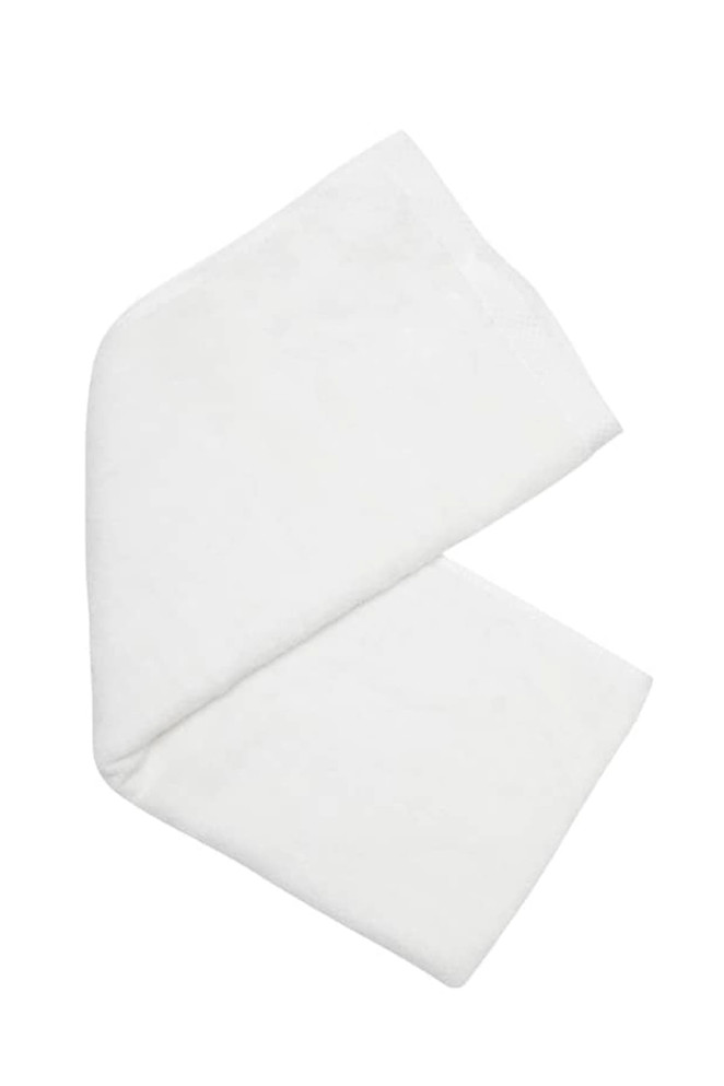 A white bamboo fitness towel, folded in a triangular shape, featuring a simple design and a logo.