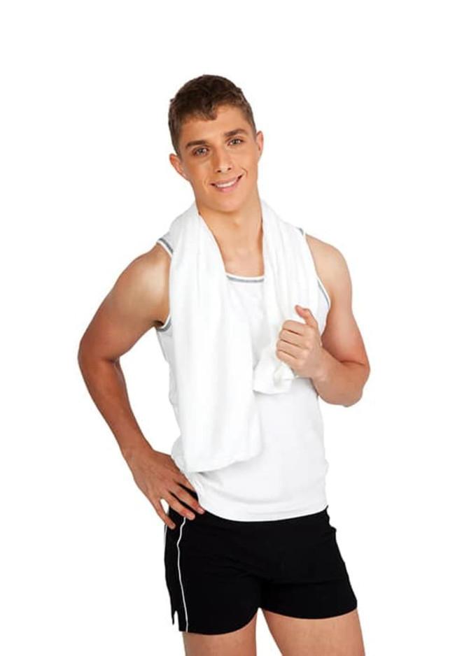 A fitness towel in white draped over the shoulder of a young man wearing a sleeveless top and shorts.