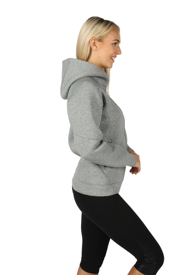A grey women's junior hoodie with a hood, paired with black leggings, displayed on a model from the side.