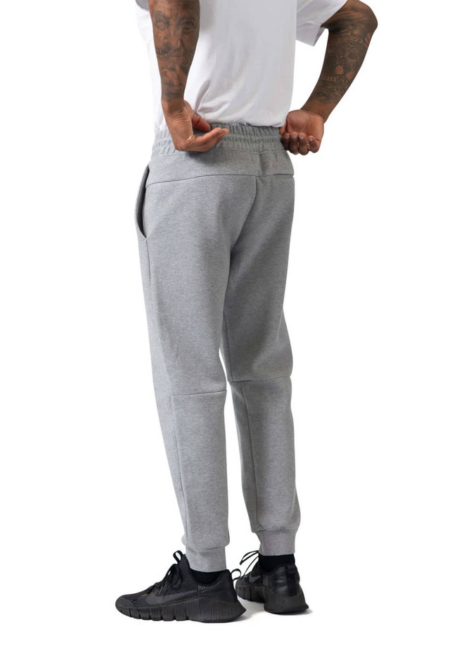 Men's three-layer cotton sandwich pants in grey, featuring a comfortable elastic waistband and tapered fit.