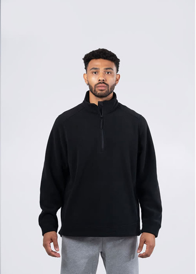 A black polar fleece half zip top is displayed on a model, featuring a relaxed fit and a standing collar.