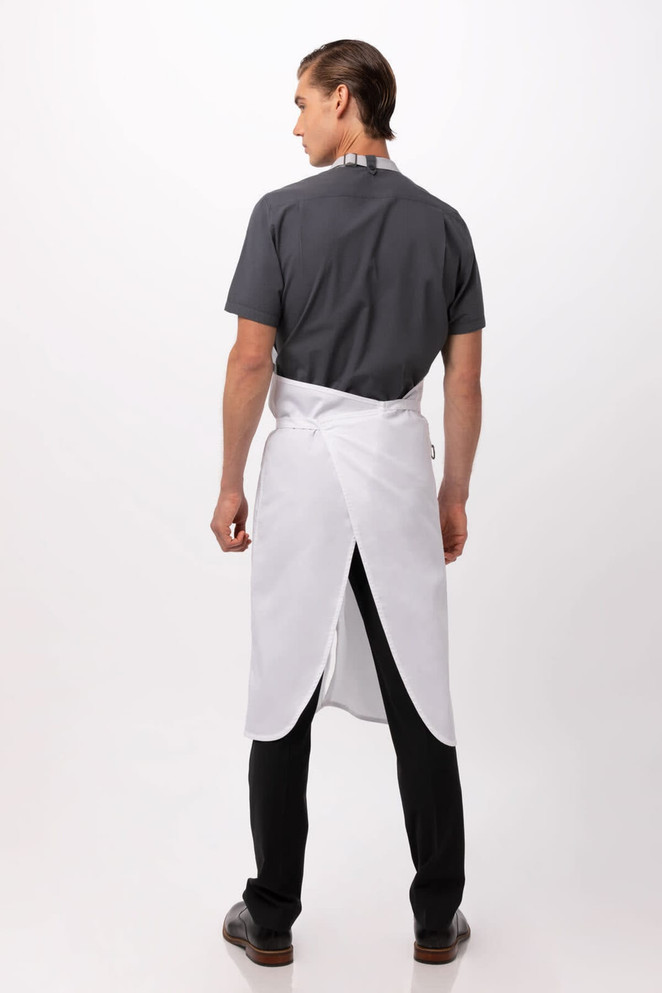 A white bib apron worn over a grey shirt, featuring an adjustable neck strap and a simple design.