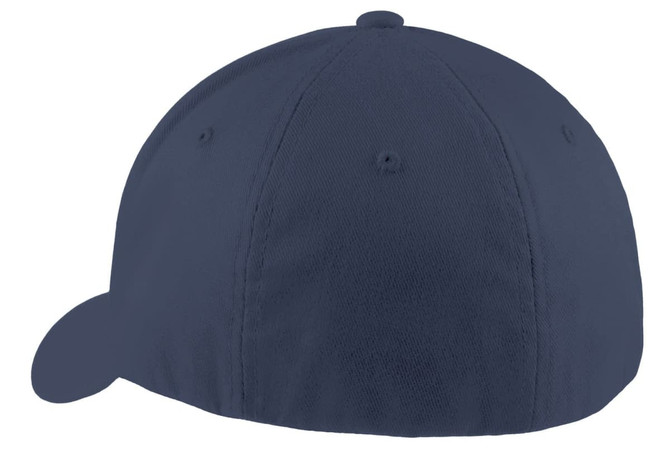 A navy blue Port Authority Flexfit cap featuring a fitted design and a logo on the side.
