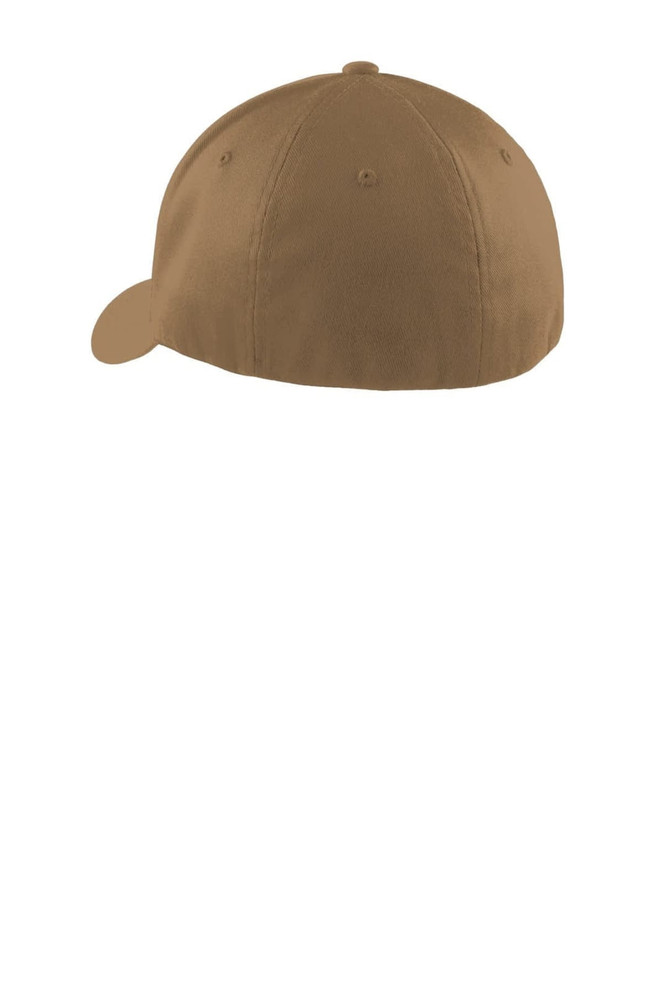 A brown Port Authority Flexfit cap featuring a curved peak and a logo on the side.