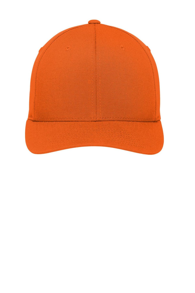 An orange Port Authority Flexfit Cotton Twill Cap, featuring a solid design and a branded logo.