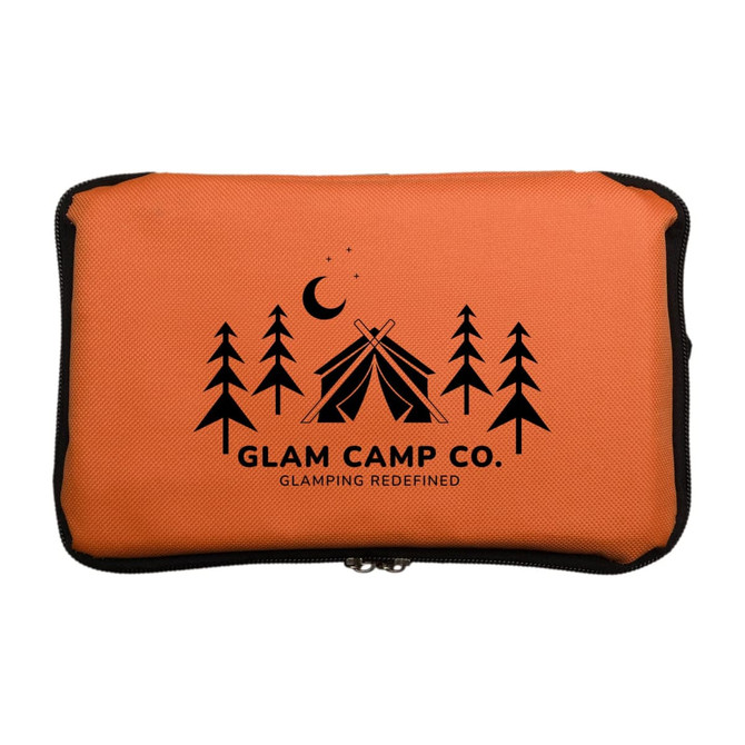 An orange zippered pouch featuring a camp-themed design with trees and tents, along with a logo.