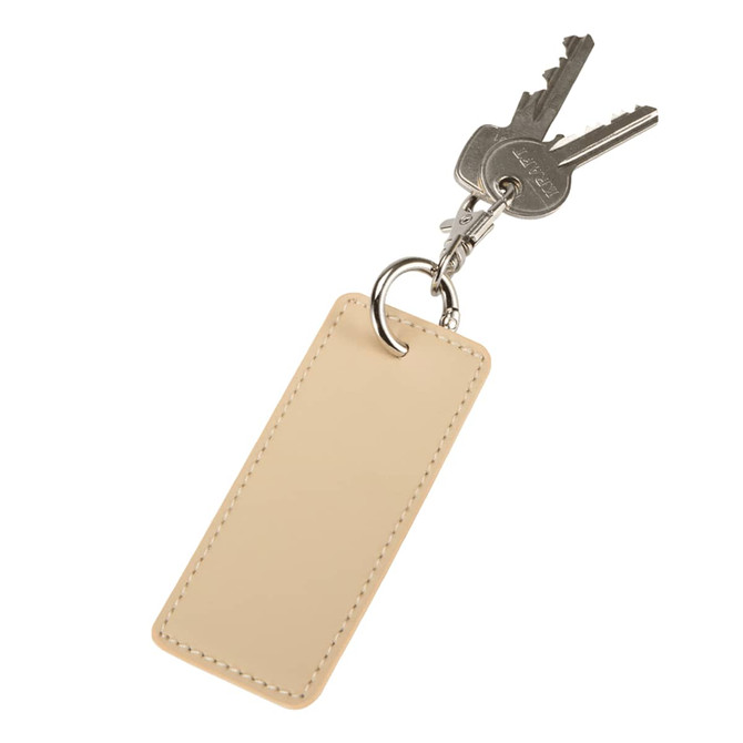 A rectangle keychain in beige with a small metal ring attached to keys. It has a logo on the keychain.