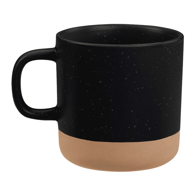 A ceramic coffee mug featuring a black upper body with a speckled finish and a smooth tan lower section. Contains a logo.