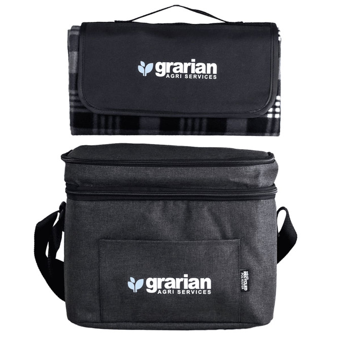A black and grey cooler bag with a matching picnic blanket on top, featuring a logo.