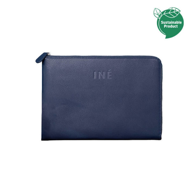 A navy tablet case with a zip closure, featuring a logo and an eco-friendly badge.