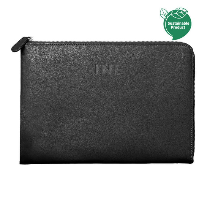 A black laptop case with a textured finish and a logo, designed for 14/15 inch laptops.