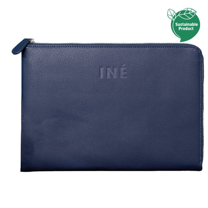 A navy laptop case featuring a textured surface and a branded logo, designed for 14/15-inch laptops.