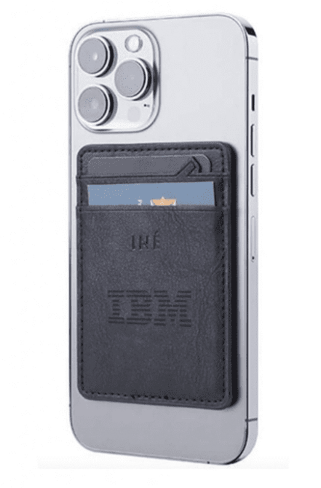 A black leather wallet with an embossed logo, attached to the back of a silver smartphone, holding cards.
