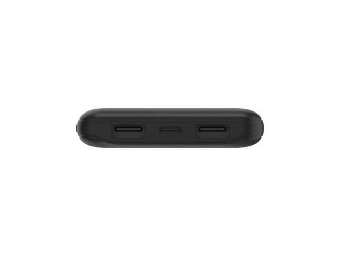 A black power bank featuring USB ports and a central connection point. It has a sleek, compact design.