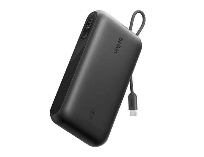 A black power bank with an integrated cable and display, featuring a logo and a compact design.