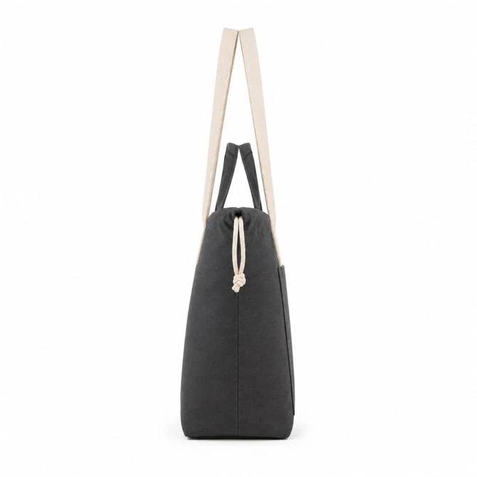 A grey tote bag with cream straps and a drawstring closure, featuring a side pocket.
