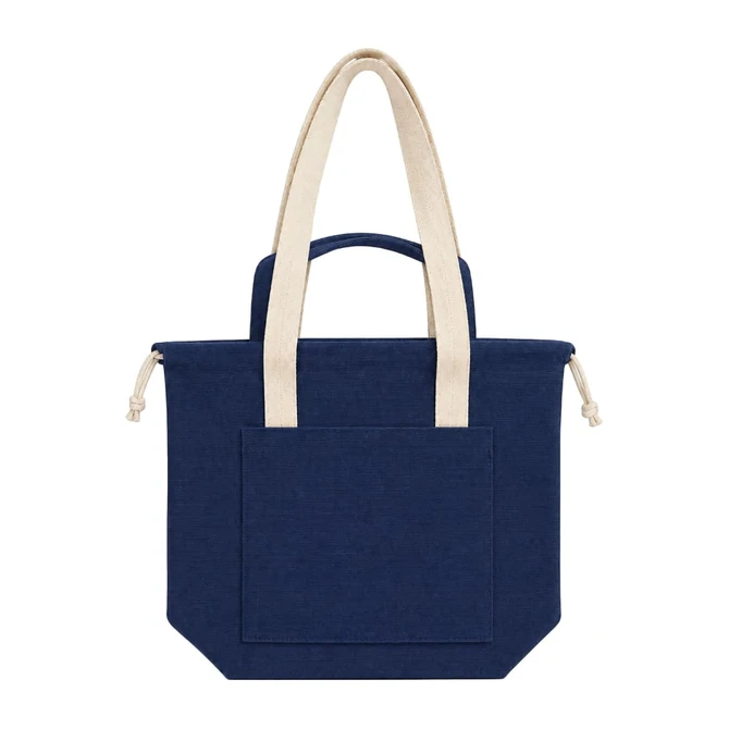 A navy tote bag with cream handles and a front pocket, featuring a branded logo.