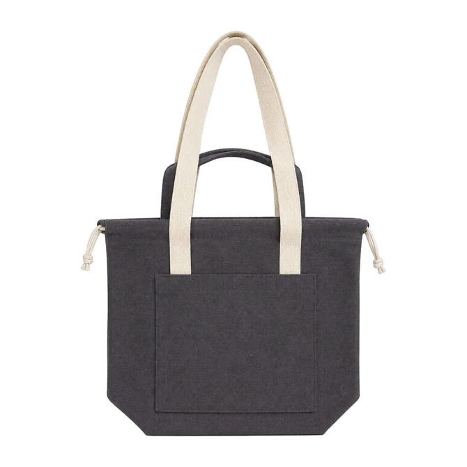 A dark grey tote bag with beige handles and a front pocket, featuring a logo.