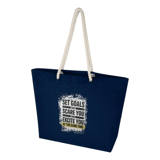 A navy blue tote bag with a textured design, featuring a logo and white rope handles.