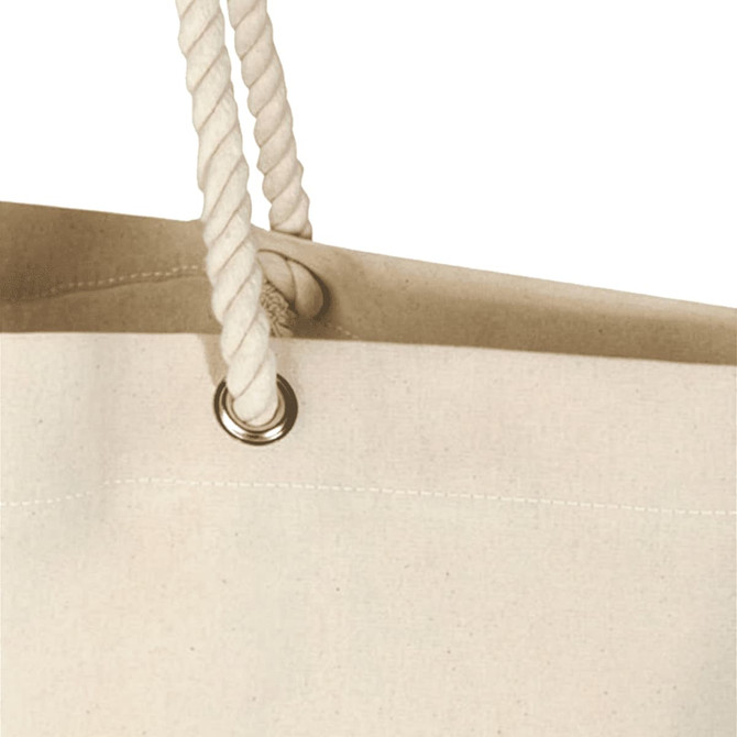 A cream-coloured tote bag featuring rope handles and a metal eyelet. It includes a logo on the front.