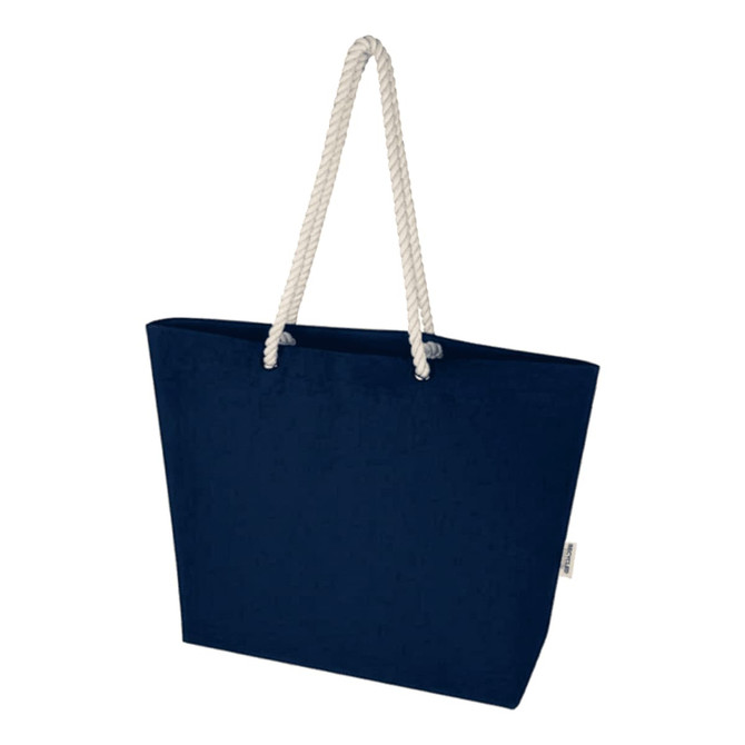 A navy blue tote bag with a rope handle and a simple design, featuring a logo. Ideal for carrying essentials.