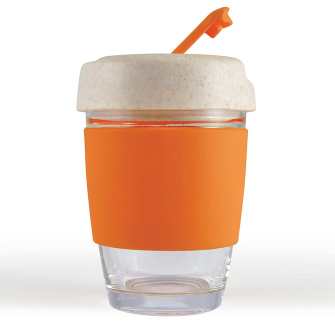 A reusable coffee cup with a clear body and an orange silicone band, topped with a light-colored lid and straw.