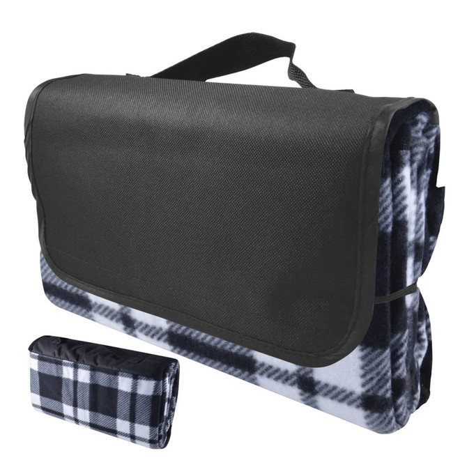 A black and white checkered picnic blanket, folded with a carrying handle. It features a sleek black exterior.