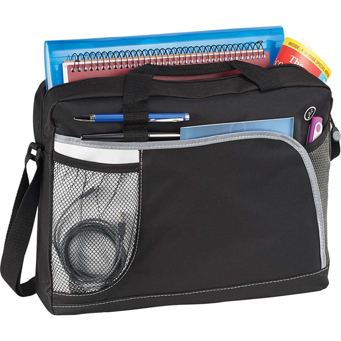 A black laptop bag with a mesh pocket, filled with notebooks, a pen, and various accessories.