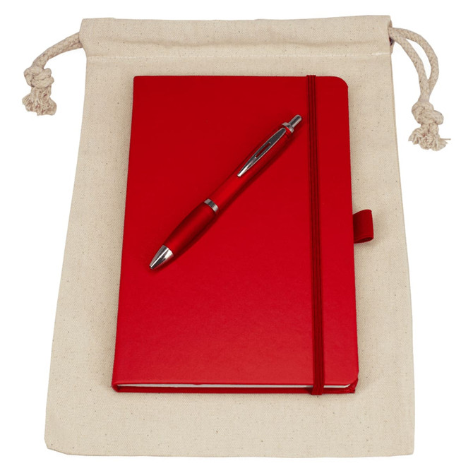 A beige drawstring bag containing a red journal and a red pen, featuring a logo.