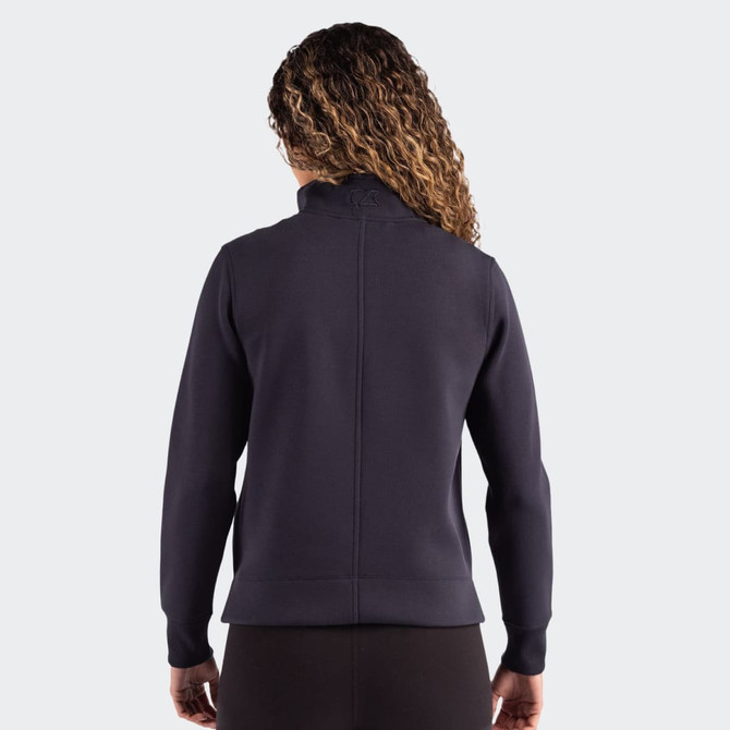 A women's half-zip jacket in navy with a fitted design, featuring a collar and long sleeves. It has a logo on the back.