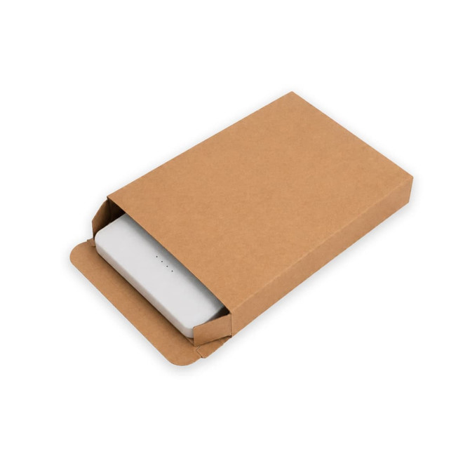 A white power bank partially visible in a brown cardboard box, with a minimalistic design.