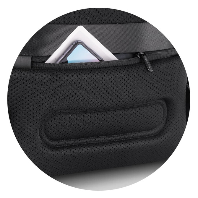 A black gym bag with a textured surface, featuring a zippered pocket containing a tablet or similar device.