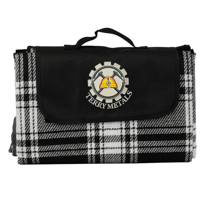 A black and white checkered picnic rug with a logo on the front and a carrying handle.