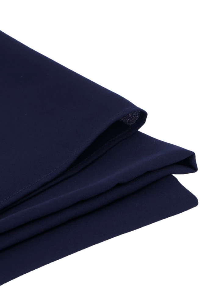 A navy blue women's hijab with a smooth texture, neatly folded. The fabric appears lightweight and drapes elegantly. A navy blue women's hijab with a smooth texture, neatly folded. The fabric appears lightweight and drapes elegantly.