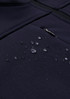 A navy men's softshell jacket with droplets of water on the fabric, showcasing its water-resistant properties.
