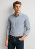 A long sleeve button-up shirt featuring a blue and white check pattern, styled with a classic collar.