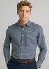 A long sleeve button-up shirt in navy blue and white check pattern, featuring a collar and buttons.