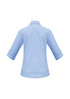 A women's 3/4 sleeve button-up shirt in light blue, featuring a back view with a smooth design and a logo.