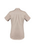 A short sleeve women's work shirt in a light beige colour, featuring a back yoke and a brand logo.