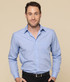 A button-up shirt in light blue with long sleeves and a single chest pocket. Features a brand logo.