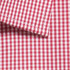 A red and white gingham button-up shirt featuring a folded collar and check pattern. The fabric has a smooth texture and a logo.