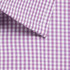 A close-up of a purple and white gingham patterned button-up shirt with a collar.