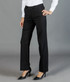 Black utility pants displayed on a model, paired with high heels, showcasing a tailored fit and versatile style.