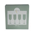 A green box containing four ribbed champagne glasses, featuring a circular logo on the front. A green box containing four ribbed champagne glasses, featuring a circular logo on the front.