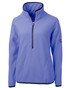 A light purple eco-friendly half zip jacket made from Sherpa fabric, featuring a zipped collar and a logo. A light purple eco-friendly half zip jacket made from Sherpa fabric, featuring a zipped collar and a logo.