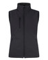 A black softshell vest with a high collar and zippered pockets, featuring a logo on the chest.